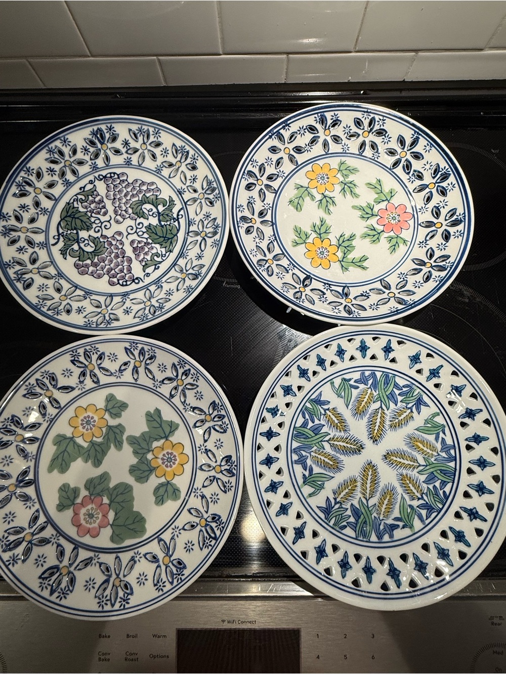 Set of 4 Decorative Floral Ceramic Plates - Blue, Yellow, Green